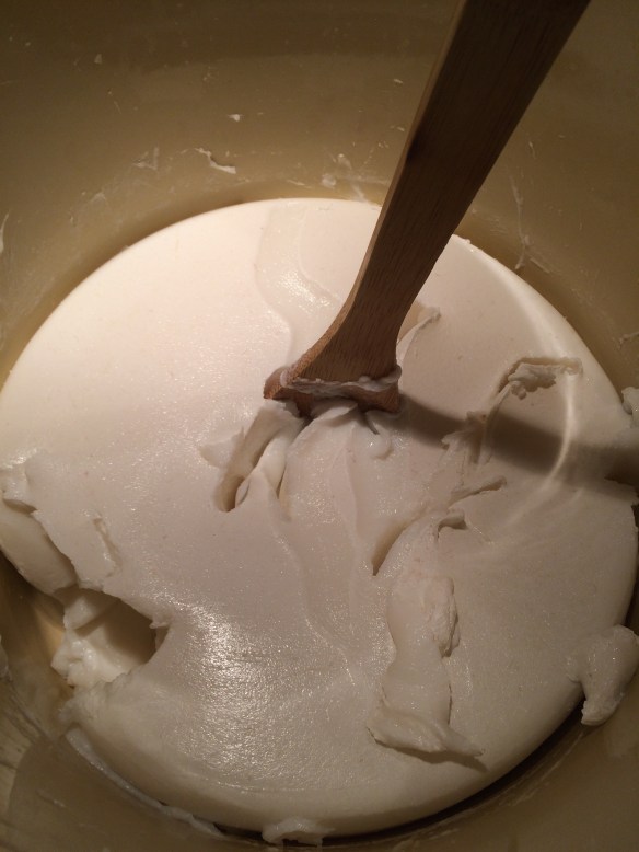 Allow mixture to sit for 12 hours. It should NOT be one gelatinous bar of soap like this. I ended up adding another half gallon of water, simmering again, and letting it sit about another 12 hours - a total of 1.5 gallons and a day of work.